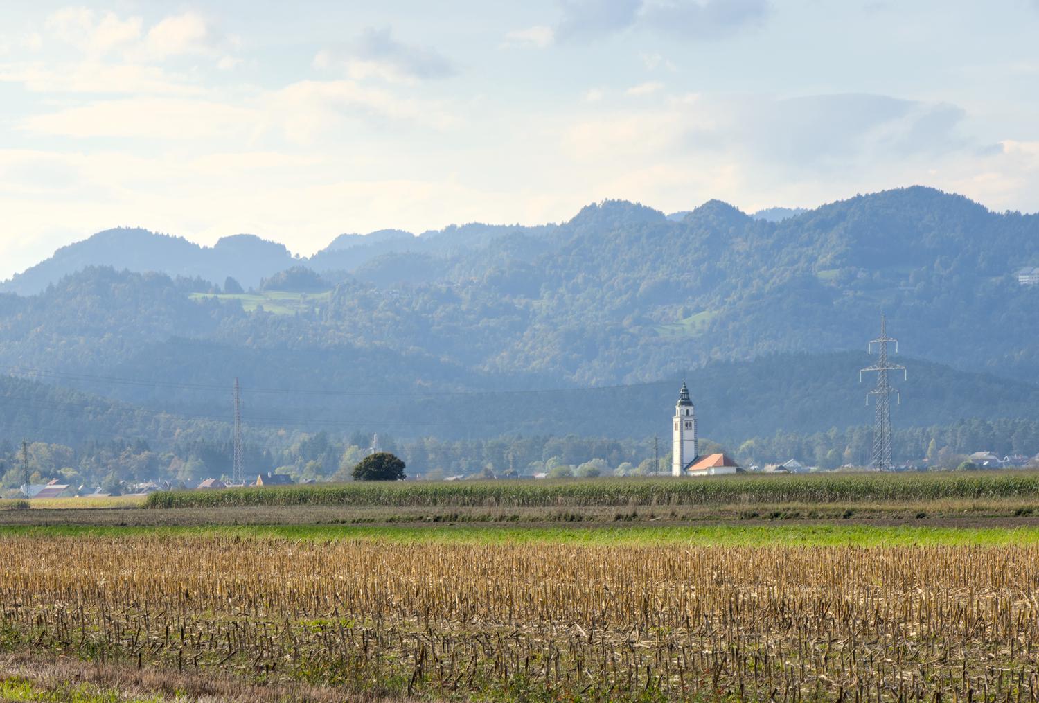 small church on farm field
